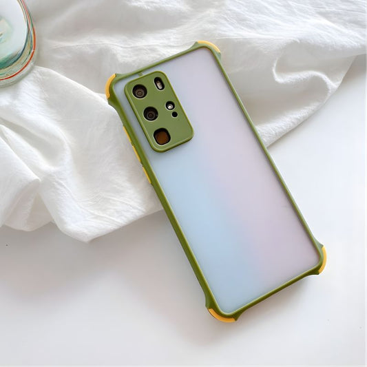 Phone case with green border on a white fabric background
