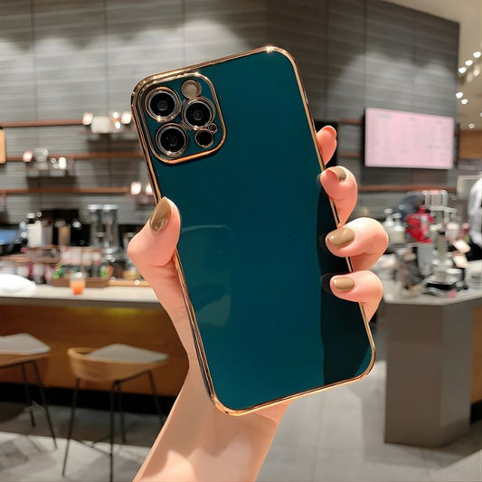 Person holding a teal phone case with a blurred cafe background